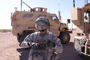 A Soldier demonstrates Nett Warrior, a Soldier-worn mission command system that is under evaluation (photo courtesy of www.army.mil)