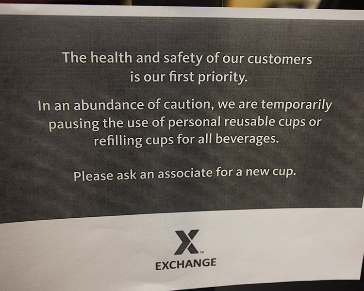 March 30, 2020  A sign on the front door of the AAFES Exchange / fuel station informing patrons of recent changes.