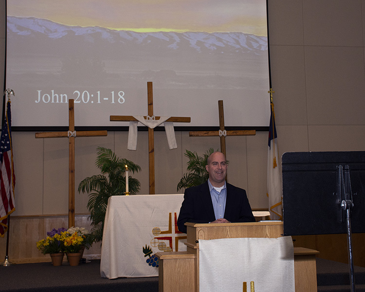 Chaplain (Lt. Col.) Shawn Gee of the Dugway Hope Chapel begins Easter Sunrise Service April 12, 2020 at Dugway Proving Ground. The COVID-19 pandemic required it be broadcasted to residents to watch on their computers. Inclement weather required it to be indoors. Photo by Al Vogel, Dugway Public Affairs