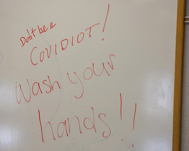 March 25, 2020 - The opportunity of a blank whiteboard at the ACS Building prompted someone to write a reminder of the need for basic prevention measures. Washing hands frequently in hot water with a bubbly soap for at least 20 seconds is suggested by health experts.