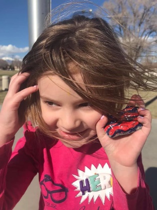 This little girl found more than 12 of the painted rocks placed around English Village.