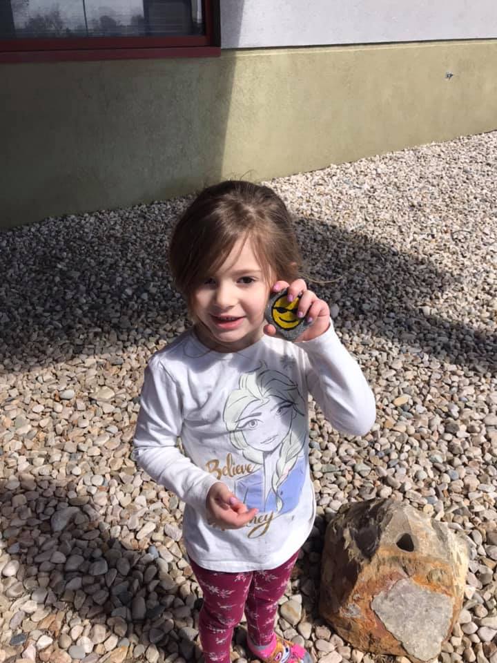 This little girl found more than 12 of the painted rocks placed around English Village.