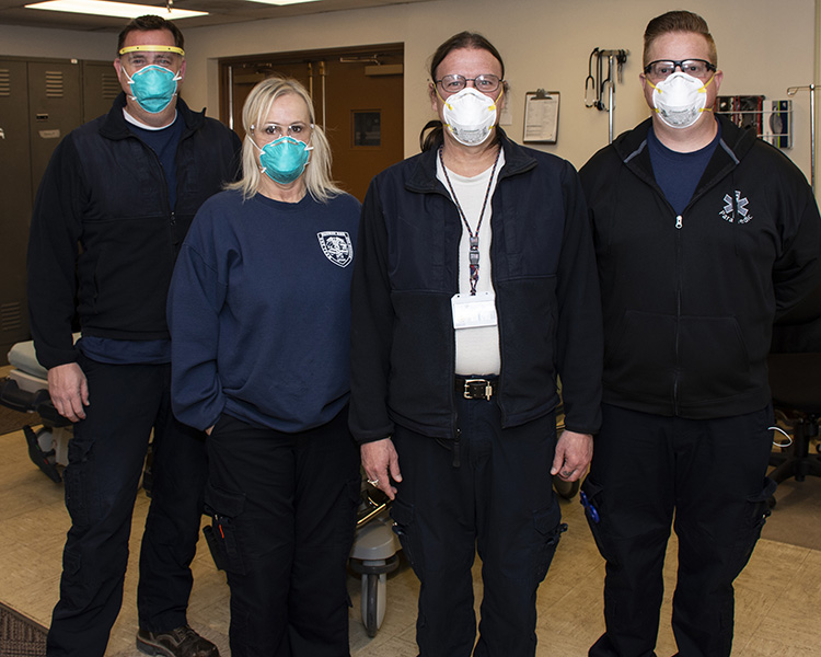 Emergency medical first responders at Dugway Proving Ground wear the M95 protective mask when they respond. Left to right: Geoff Hales, Kelly Jay, Derrell Farrar and John Mittelman. Photo by Al Vogel, Dugway Public Affairs.