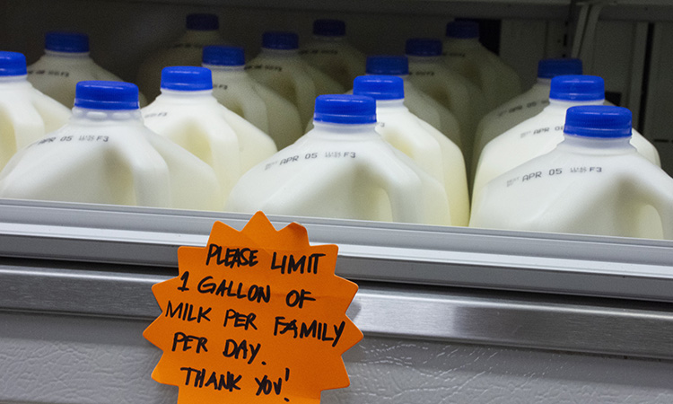 March 25, 2020 - A sign at the Commissary reminds shoppers that high-demand items such as milk are being rationed.