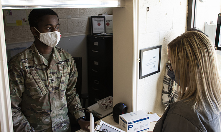 Dugway Health Clinic personnel established a temporary vaccination site Jan. 14, 2021 in the gym of the School Age Services building. They practiced how they will inoculate the first personnel on Dugway Proving Ground to receive the Moderna COVID-19 vaccine. Photo by Al Vogel, Dugway Public Affairs