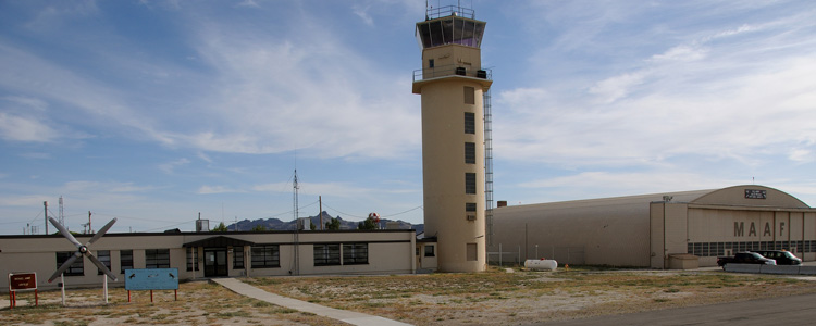 Hangar 1 (right) was built 1943-44, making it one of the oldest structures on Dugway Proving Ground. The active flight offices and unused air tower at left were built in the early 1950s. Someday, a new air tower may be built but no decision has been made.