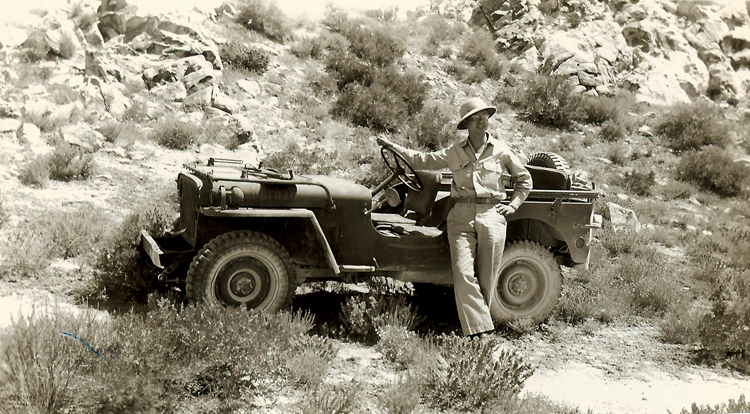 A photo to make Jeep lovers salivate. A Soldier is proud of his four-wheeled-wonder on Dugway Proving Ground, that took him this far. Note his pith helmet: standard issue for troops in non-combat desert areas during World War II.