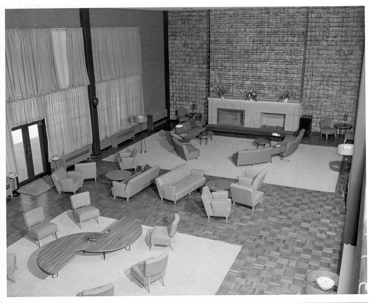 Dugway was a trendy place in the late 1950s or early 1960s, as seen by this view of what became the Community Club. The fireplace and glass doors of what is now the banquet room are easily recognizable. Love that split-circle table!