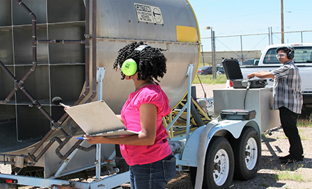 Testers using test equipment outdoors