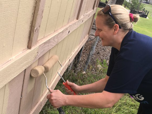 Capt. Marion E. Williams paints double-fisted