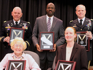 BG MacWillie, top right, receives honor