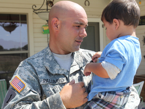 Sgt. 1st Class Kevin Palumbo with son
