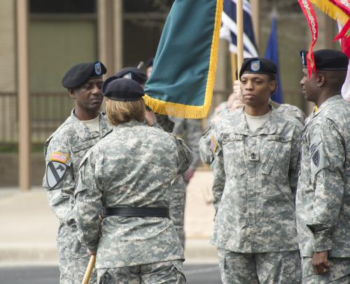 CSM Antoine Overstreet accepts command colors from BG Laura Richardson
