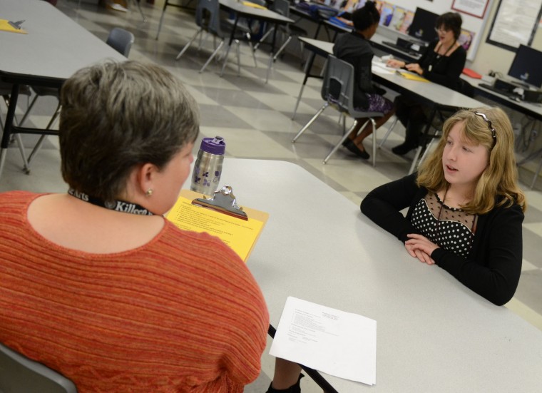 Eighth-graders take part in mock interviews