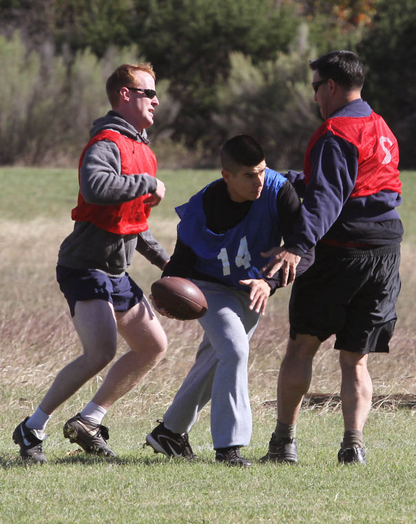 Master Sgt. Ray Barros carries ball during Holiday Bowl game