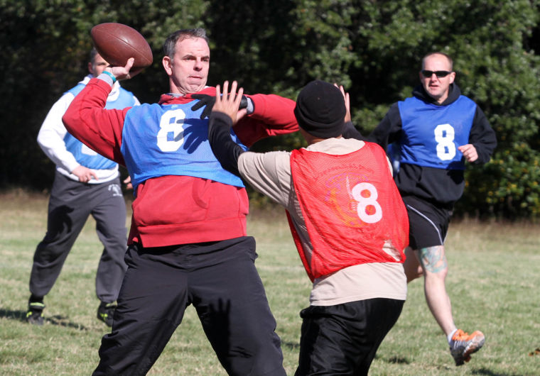 Master Sgt. Earnest Vance throws ball during Holiday Bowl game