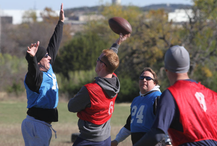 Cpt. Sam Perlick throws ball during Holiday Bowl game