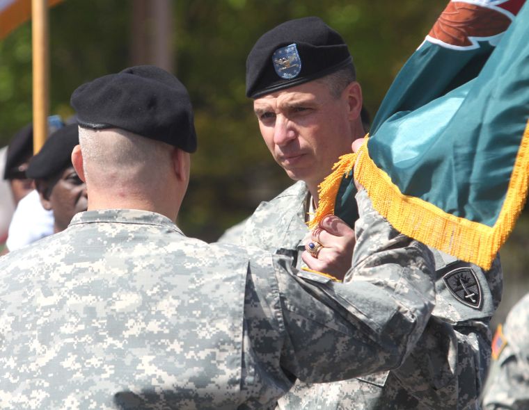 Maj. Gen. Dellarocco takes guidon from Col. Martin