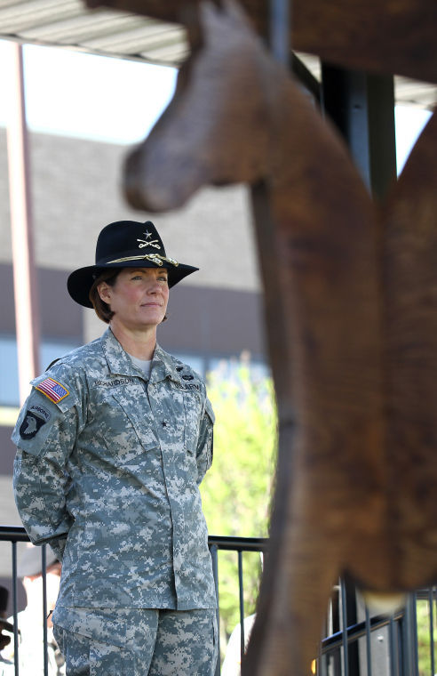 Brig. Gen. Laura Richardson listens to a speaker