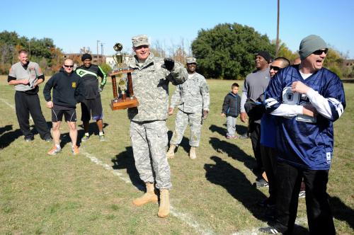 Col. Jeffery Harris awards OTC Turkey Bowl trophy to East Team