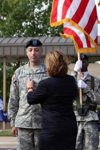 Sharise Spellmon, wife of Brig. Gen. Scott A. Spellmon, replaces his rank