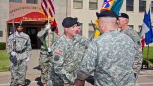 Col. Daniel R. Hirsch takes guidon from Maj. Gen. Genaro Dellarocco