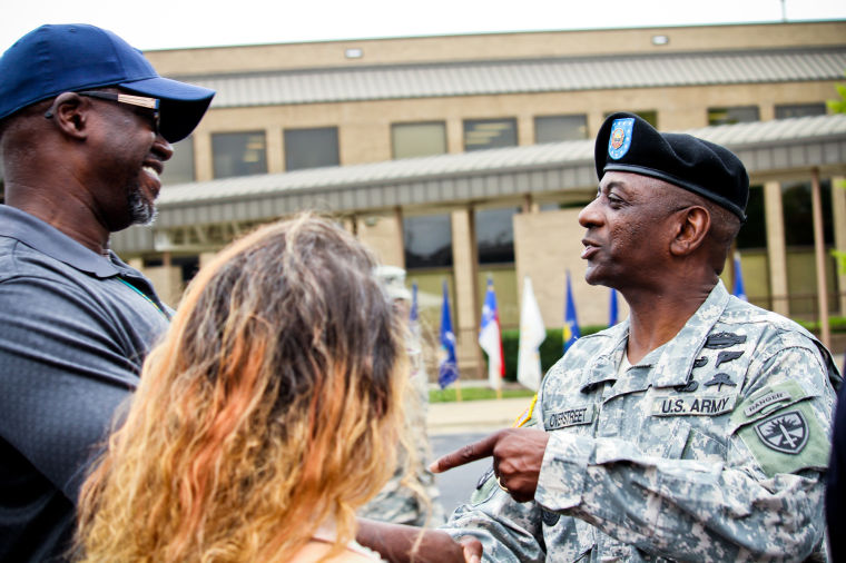 Outgoing Command Sgt. Maj. Antoine Overstreet greets guests after ceremony