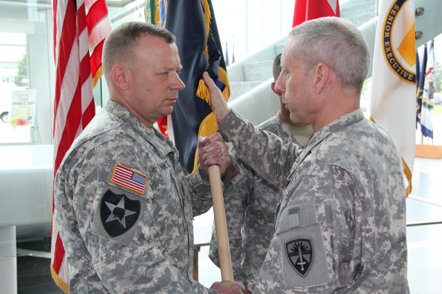 Maj. Gen. Peter D. Utley passes ATEC colors to Command Sgt. Maj. Andrew B. Connette