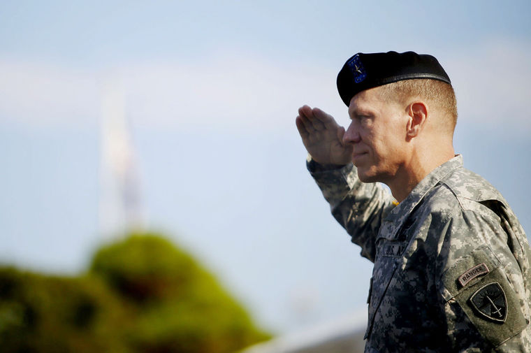 Brig. Gen. Kenneth L. Kamper salutes during assumption of command ceremony