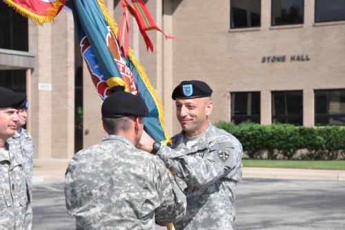 Brig. Gen. Scott Spellmon passes unit colors to Maj. Gen. Daniel Karbler