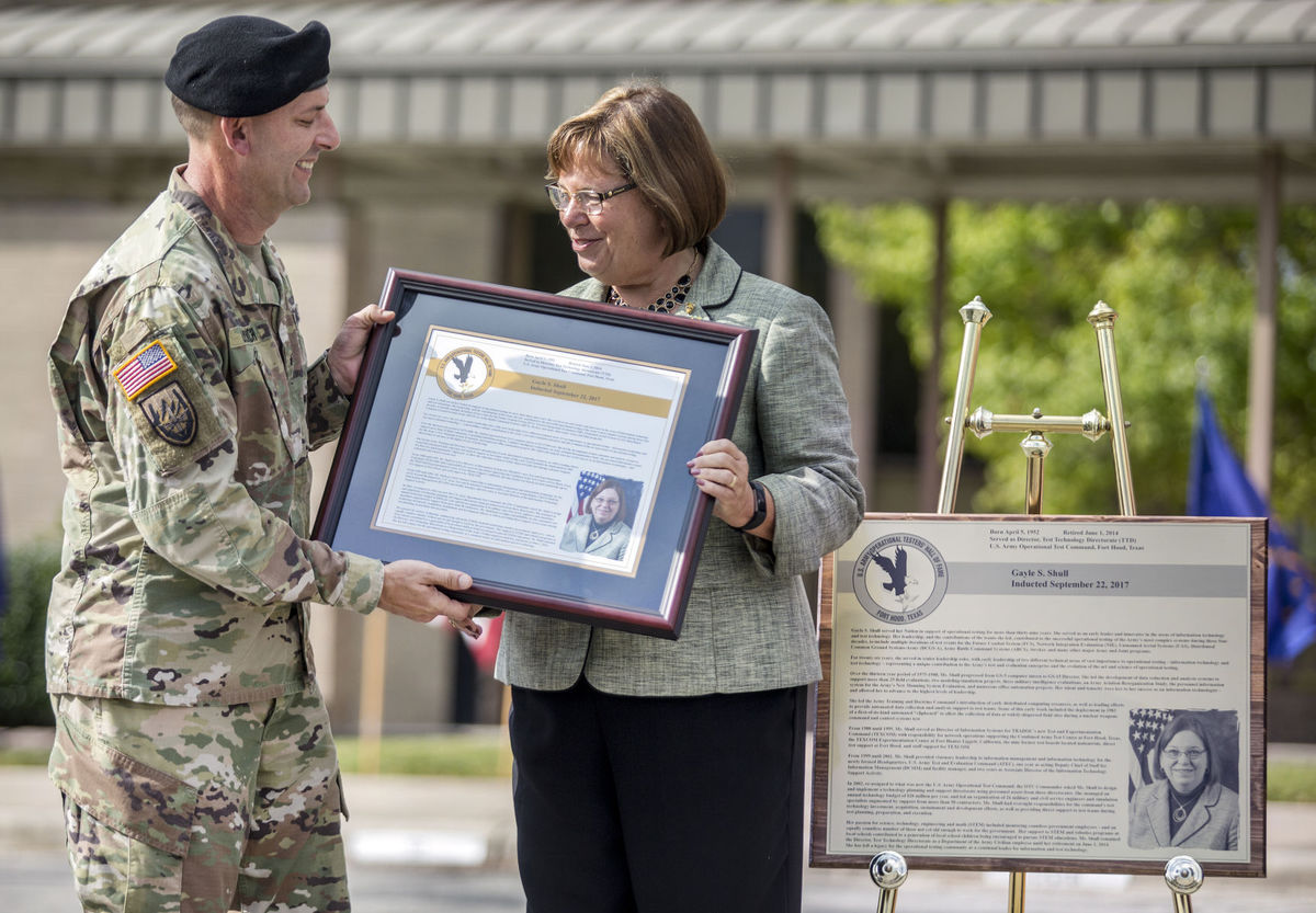 Brig. Gen. John Ulrich, left, inducts Gayle S. Shull into the U.S. Army Operational Testers' Hall of Fame during the 24th Annual Induction Ceremony at Fort Hood. (Eric J. Shelton | Herald)