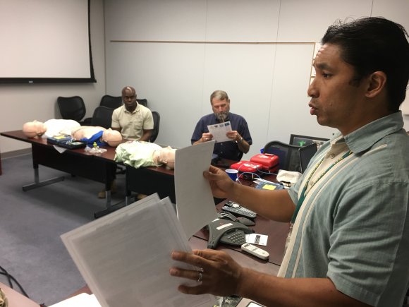 Ernesto Chee-Chong, Operational Test Command's occupational health and safety specialist, instructs a class of operational testers on American Heart Association Heartsaver and CPR. During two days, 12 Operational Test Command Soldiers and Army Civilians became qualified in basic life saving techniques. (Photo Credit: Mr. Michael M Novogradac (Hood))