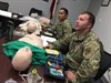 George W. Covert Jr., an operations research analyst with Operational Test Command's Methodology and Analysis Test Directorate, trains on CPR during a class on American Heart Association Heartsaver and CPR. During two days, 12 Operational Test Command Soldiers and Army Civilians became qualified in basic life saving techniques.  (Photo Credit: Mr. Michael M Novogradac (Hood))