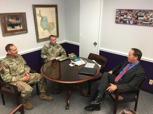 Col. (P) John C. Ulrich (left), U.S. Army Operational Test Command commander, and OTC Command Sgt. Maj. Jason Schmidt meet with Florence Independent School District Superintendent Paul Michalewicz to discuss their ongoing connection under III Corps and Fort Hood's Adopt-a-School program. (Photo Credit: Mr. Michael M Novogradac (Hood))
