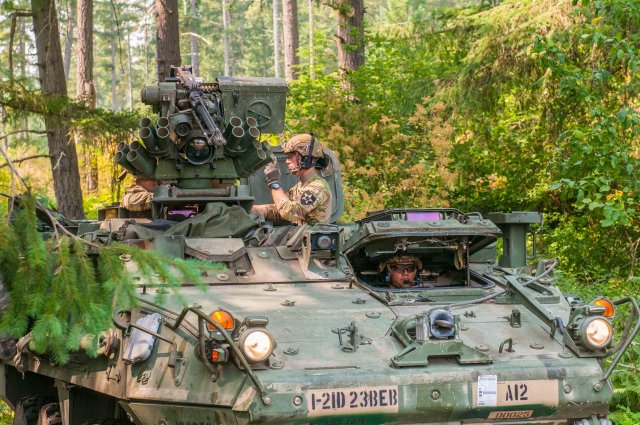 Soldiers prepare M1126 Stryker for mission