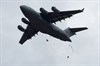 Soldiers from the 57th Sapper Company, 27th Engineer Battalion, 20th Engineer Brigade, exit a C-17 aircraft over Sicily Drop Zone, Fort Bragg, North Carolina, while performing operational testing wearing the new Integrated Head Protection System (IHPS). (Photo Credit: Jim Finney, Combined Technical Services, Airborne and Special Operations Test Directorate, U.S. Army Operational Test Command)