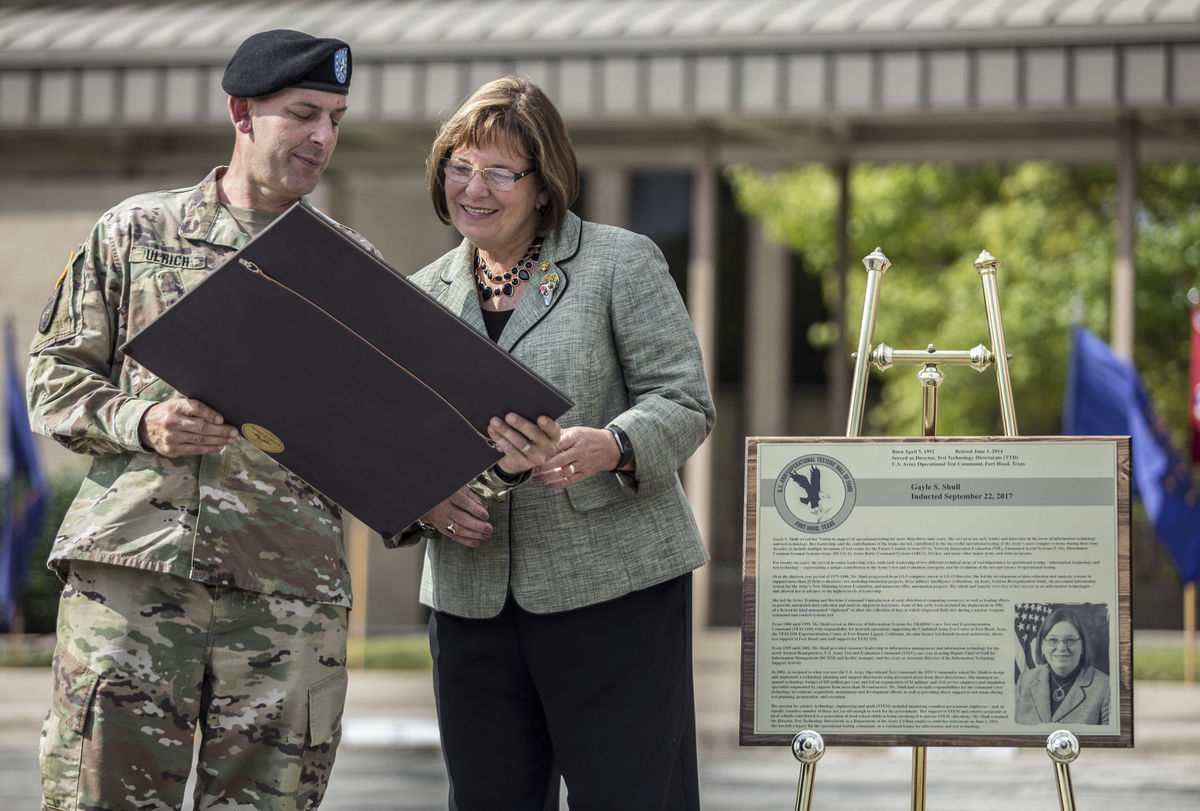 Brig. Gen. John Ulrich, left, inducts Gayle S. Shull into the U.S. Army Operational Testers' Hall of Fame Friday during the 24th Annual Induction Ceremony on Fort Hood. (Photo Credit: Eric J. Shelton | Herald)