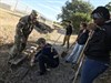 USAOTC's Command Sgt. Maj. Mario O. Terenas provides some direction to Copperas Cove ISD JROTC Cadets, while repairing a running trail at Florence ISD's High School on "Make A Difference Day." (Photo Credit: Mr. Michael M Novogradac (Hood))