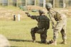 A service member fires the Sig Sauer P320 during a Modular Handgun System test for the U.S. Army Operational Test Command, conducted at Fort Bragg, Aug. 27. (Photo by Lewis Perkins/Paraglide)