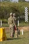 A service member fires the Sig Sauer P320 during a Modular Handgun System test for the U.S. Army Operational Test Command, conducted at Fort Bragg, Aug. 27. (Photo by Lewis Perkins/Paraglide)