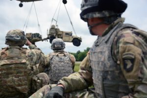Soldiers watch CH-47 Chinook