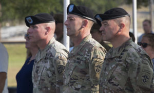 Command Sgt. Maj. Jason Schmidt (far left) stands alongside Brig. Gen. John C. Ulrich (center) and incoming OTC Command Sgt. Maj. Mario O. Terenas (right)