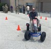 Kevin O. Kruise, a U.S. Army Operational Test Command operations officer, starts to navigate a cone course while wearing "drunk goggles" during the unit's command safety stand down Aug. 30. (Photo Credit: Staff Sgt. Scott D. Pangelinan, Operations NCO, U.S. Army Operational Test Command Public Affairs)