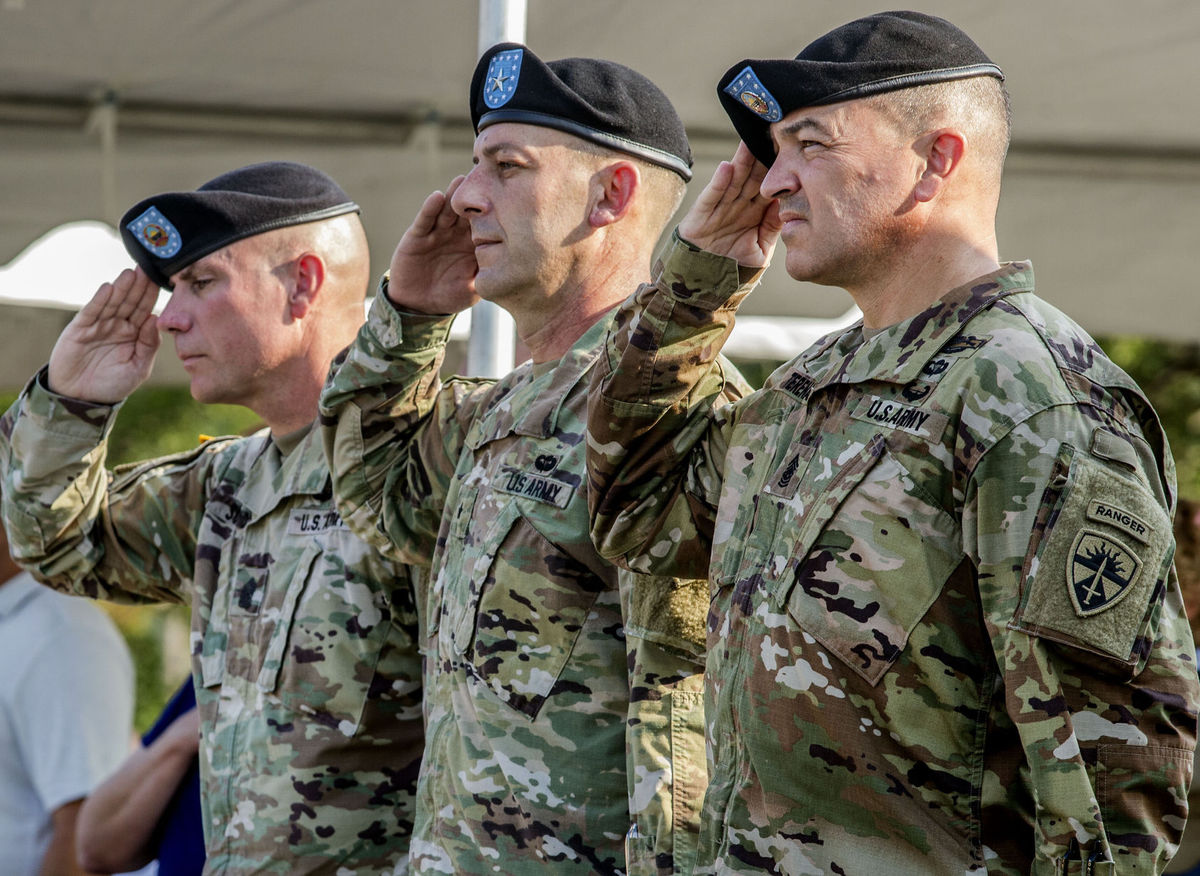Command Sgt. Maj. Jason Schmidt, Operational Test Command outgoing command sergeant major, from left, Brig. Gen. John Ulrich, commander of the Operational Test Command, and Mario O. Terenas, incoming command sergeant major, salute during the Operational Test Command Change of Responsibility Friday at Fort Hood. (Photo Credit: Eric J. Shelton | Herald)